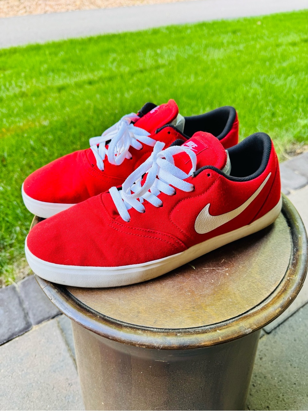 Nike Red Canvas Low-Top Sneakers with White Swoosh and Black Lining